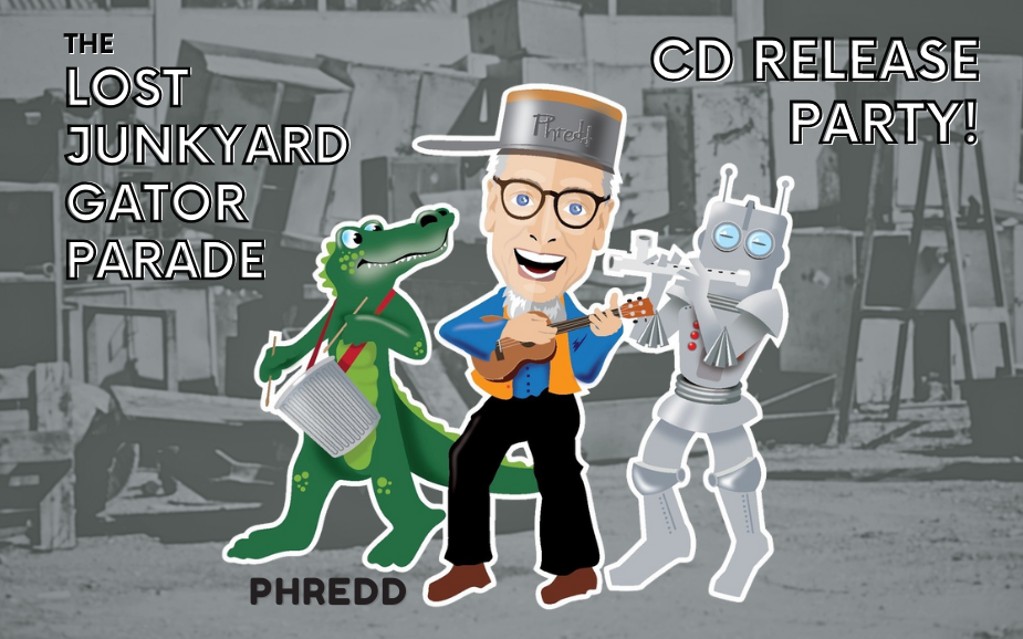 Phredd playing a ukulele on stage with a friendly green gator and a robot character, promoting The Lost Junkyard Gator Parade CD Release Party.
